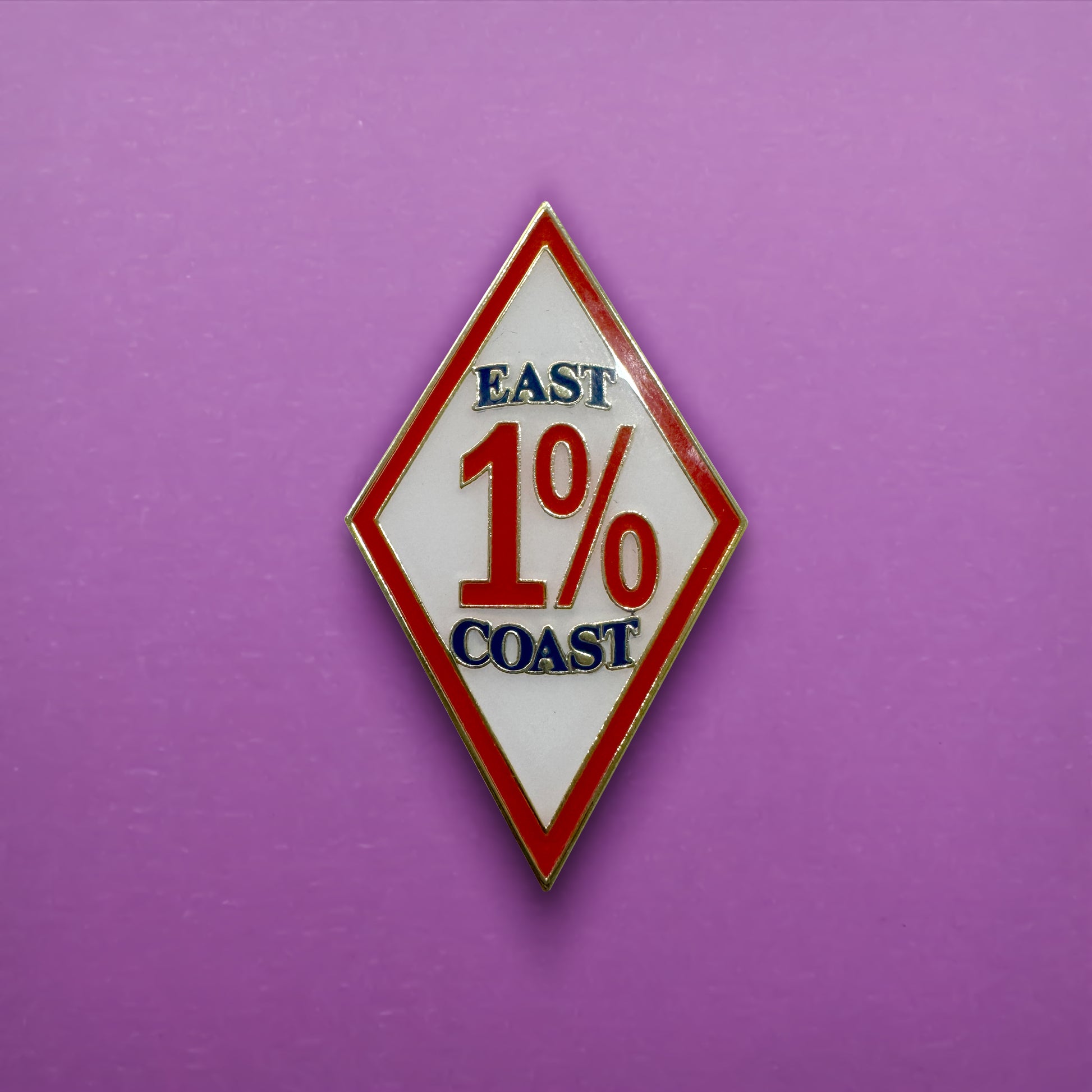East 1% Coast diamond-shaped enamel pin